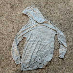 Light grey sweatshirt.